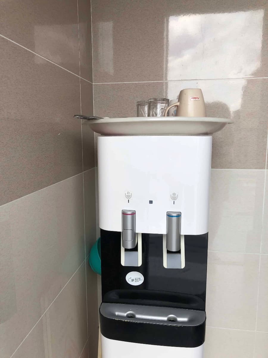 Cups are available on the water dispenser